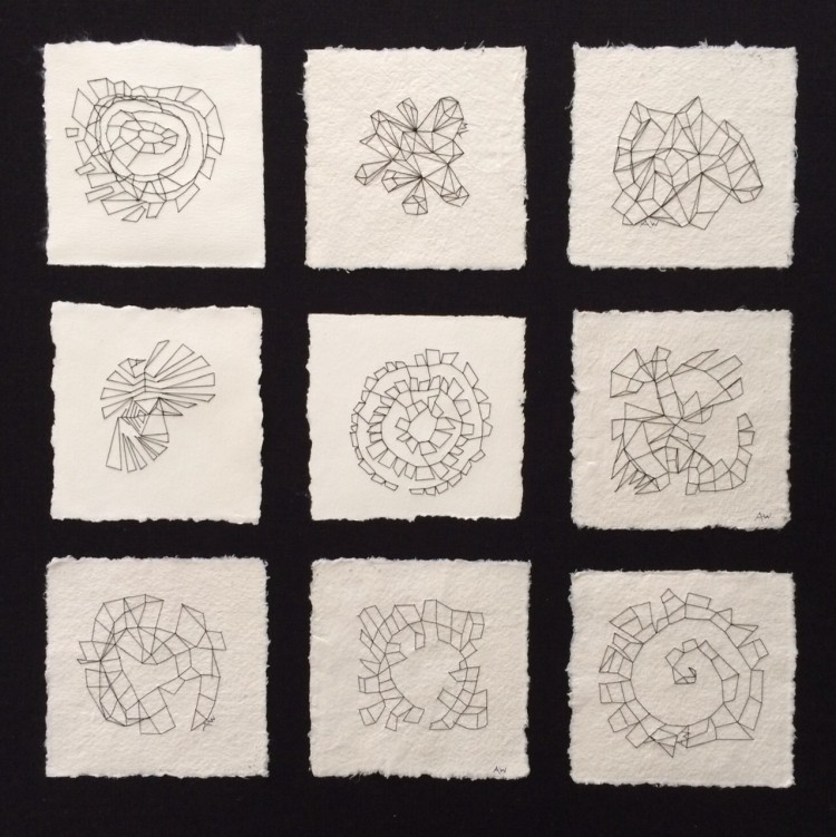 Hand stitching on thick rag paper